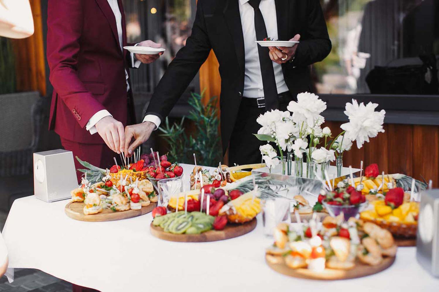 close up people serving themselves fruits buffet restaurant copy